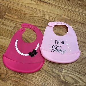 Bundle of two silicone baby bibs